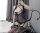 Noir Eclipse Garter Bodystocking – Black fishnet catsuit with garter illusion, cut out panels & open crotch, one size XS–L (EU 34–40), curve shaping stretch