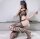 Noir Web Mosaic Bodystocking – Schwarzer Netz-Catsuit mit Strapsoptik, floralen Details & Cut-Outs, XS–L